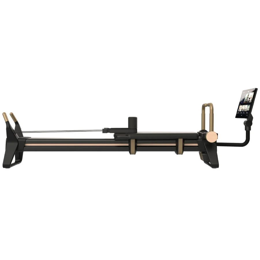 Modern Pilates reformer with carriage, springs, and a tablet mounted on a stand for guided workouts