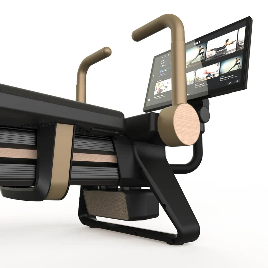 High-tech treadmill with a wide screen monitor mounted at the front for workout programs.
